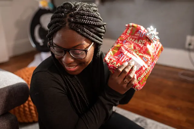 Box braids, unwrapping a gift