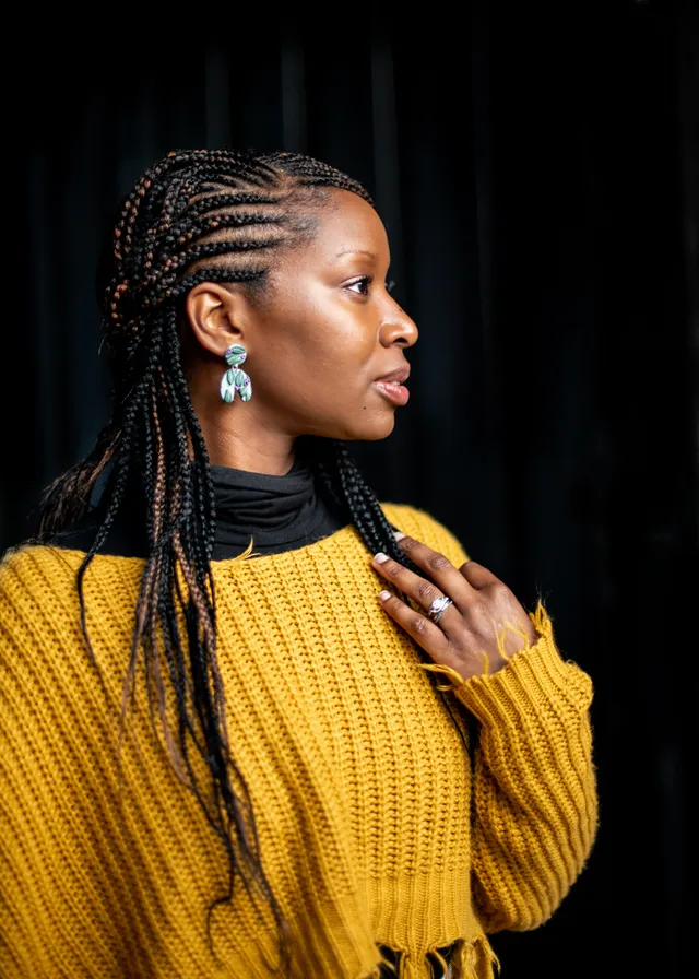 Portrait with cornrow styling